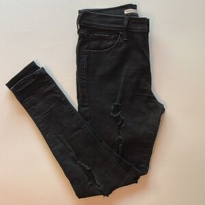 Levi's black denim distressed ripped 720 High Rise super skinny stretch jeans